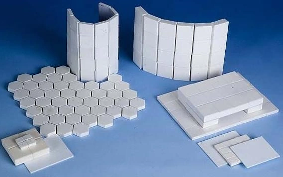 Microcrystalline alumina linings as hexagonal mats, curved segments and square tiles