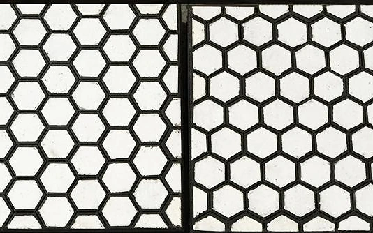 Composite plates with hexagonal alumina tiles embedded in rubber